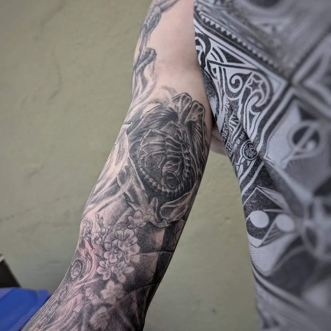 Tattoo by @graffitilostpdx — black_and_grey, realism
