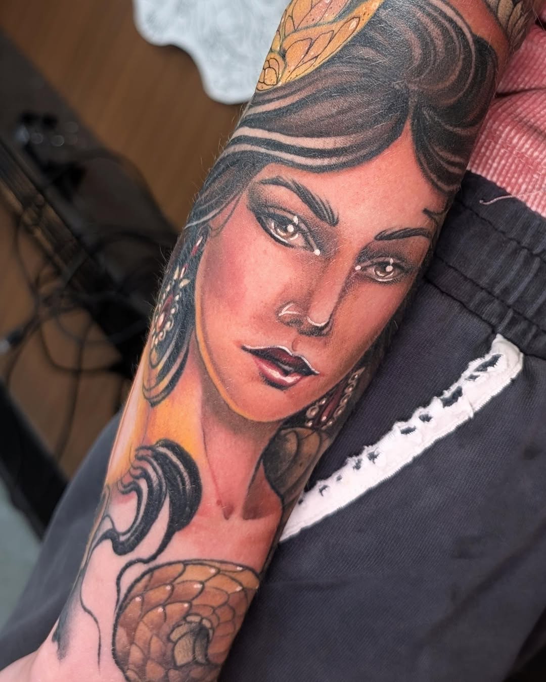 Tattoo by @jainagoldtattoos — realism, black_and_grey