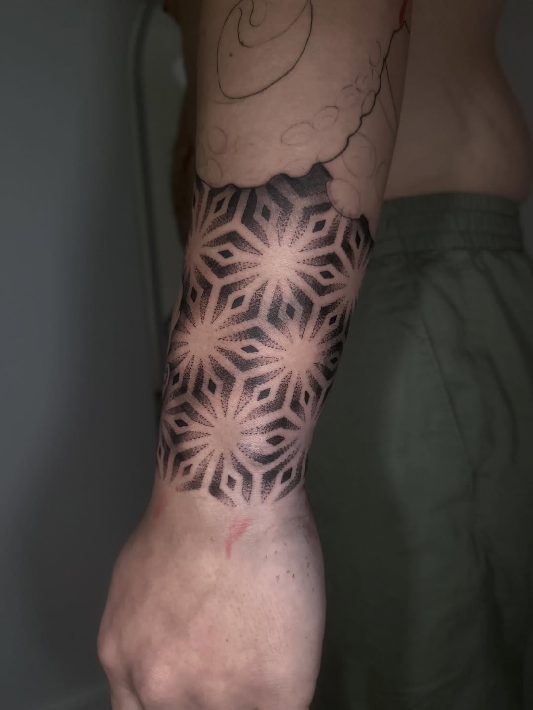 Tattoo by @whitehorsetattooing — geometric, dotwork