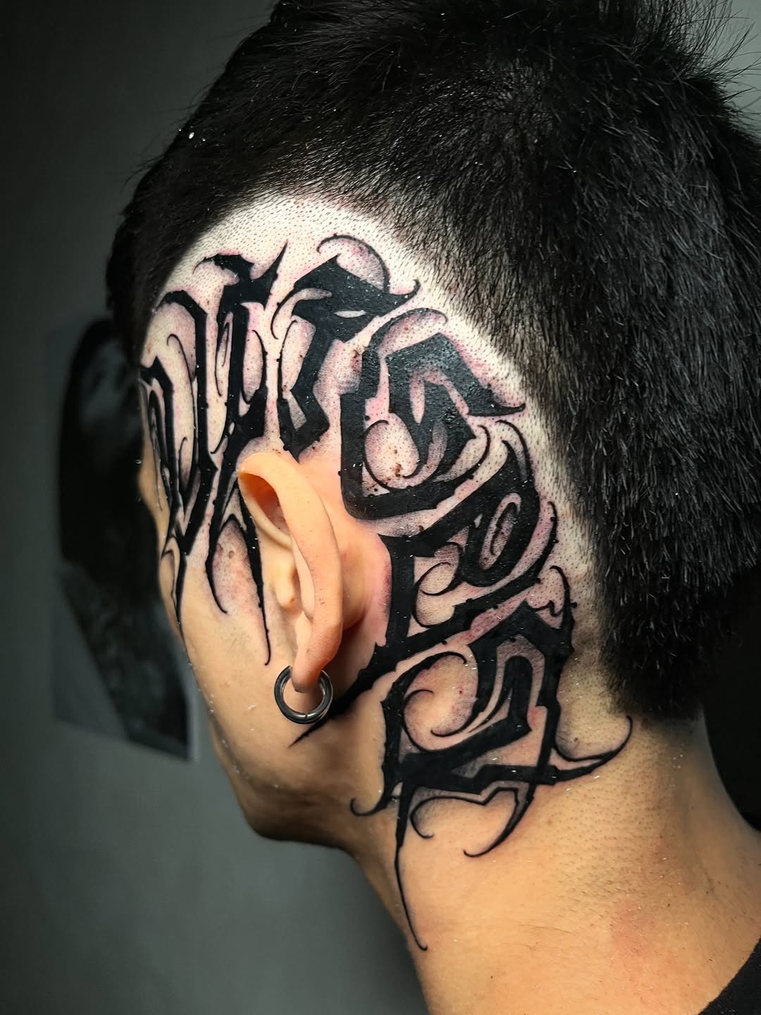 Tattoo by @toretattoo_311 — lettering_script, blackwork