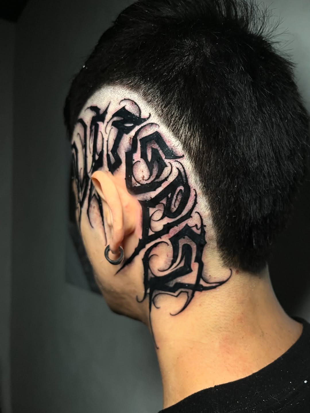 Tattoo by @toretattoo_311 — lettering_script, blackwork