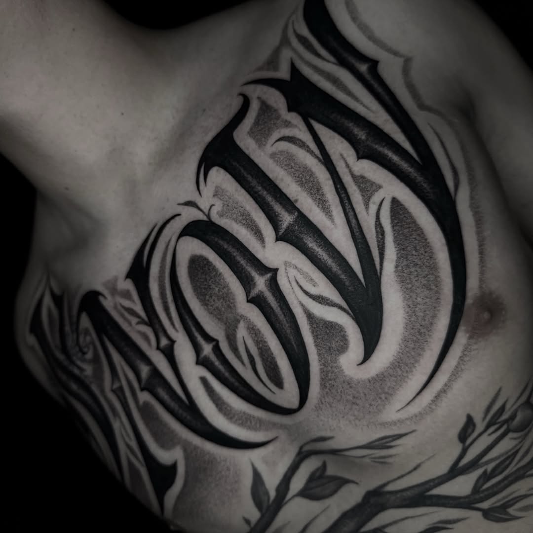 Tattoo by @the_alkomist — lettering_script, black_and_grey