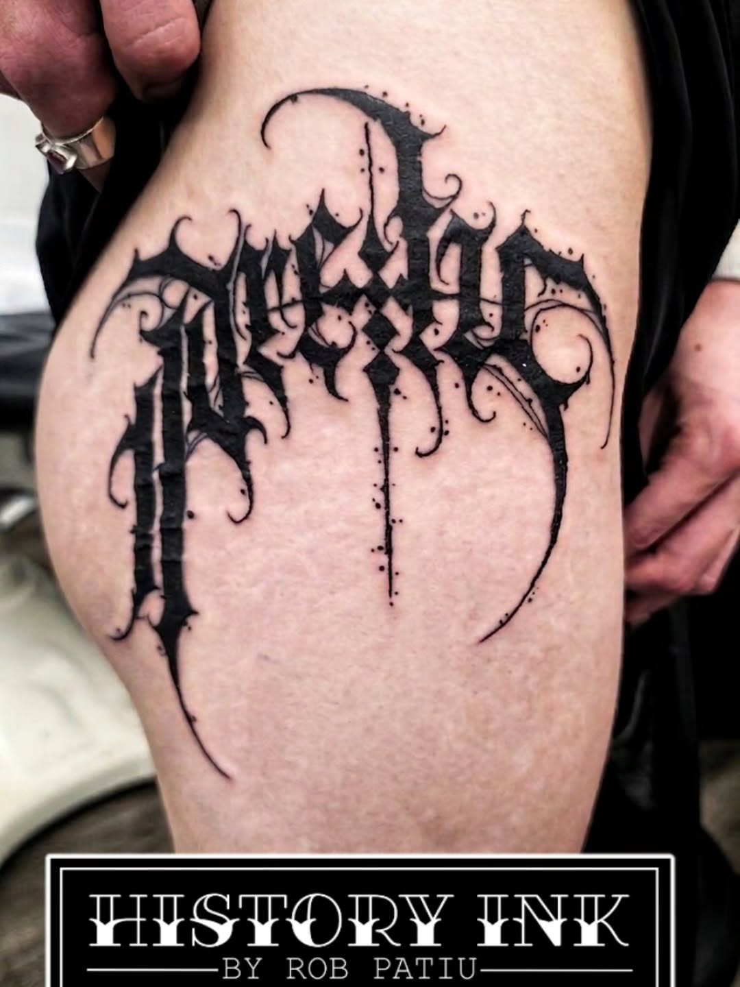 Tattoo by @robby_patiu — lettering_script, blackwork