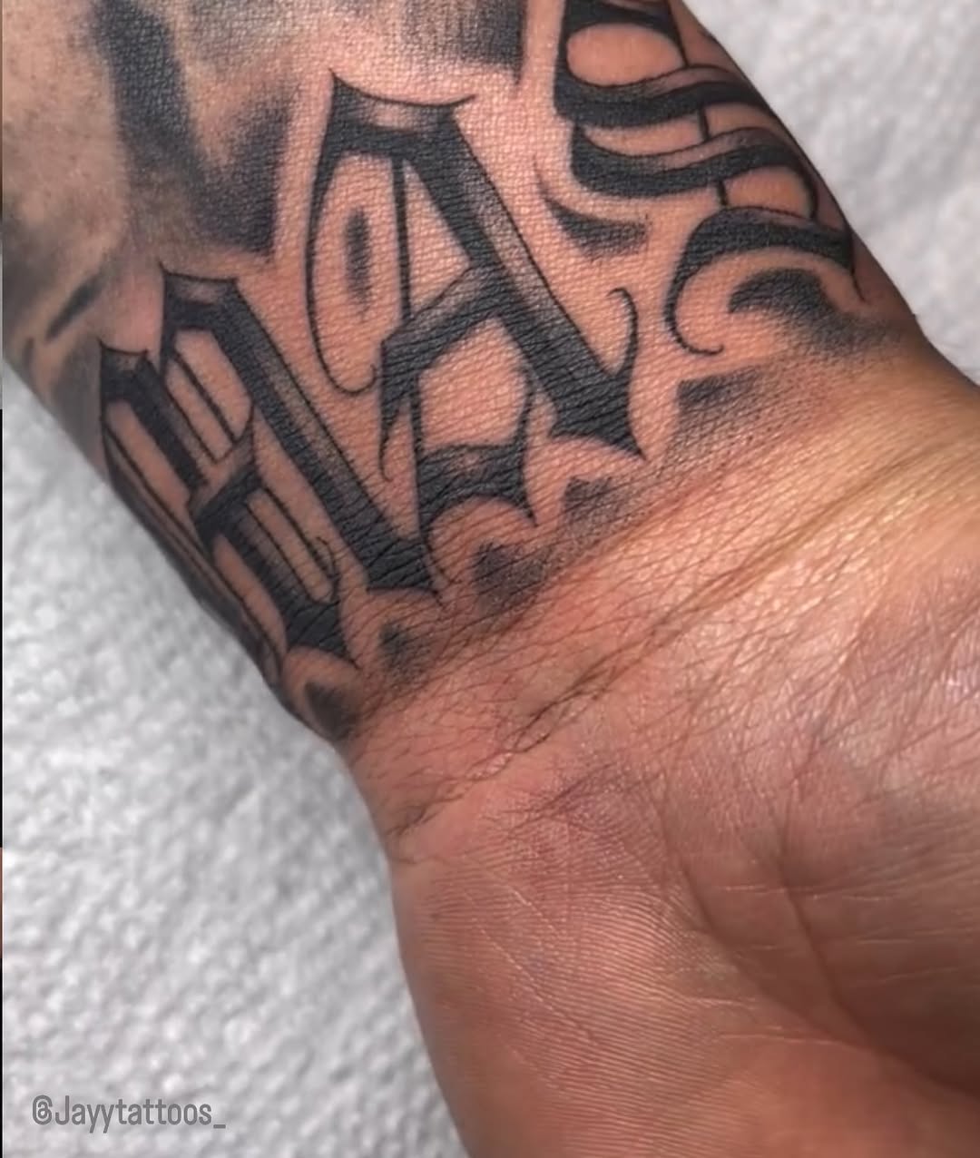 Tattoo by @jayytattoos_ — lettering_script, chicano