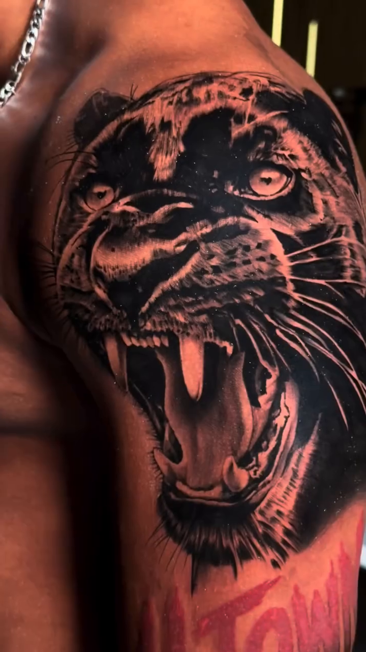 Tattoo by @monkey.tattoo.art β realism, black_and_grey