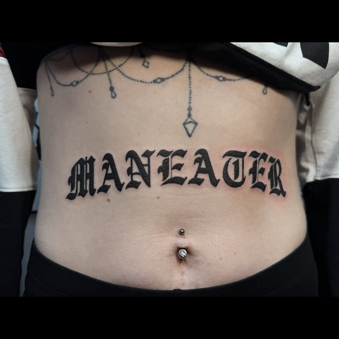 Tattoo by @artbydollface — lettering_script, blackwork
