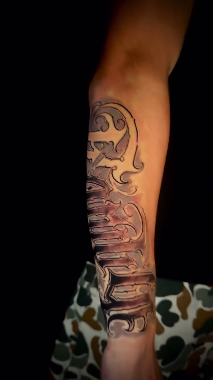 Tattoo by @romanstarkey_ — black_and_grey, lettering_script