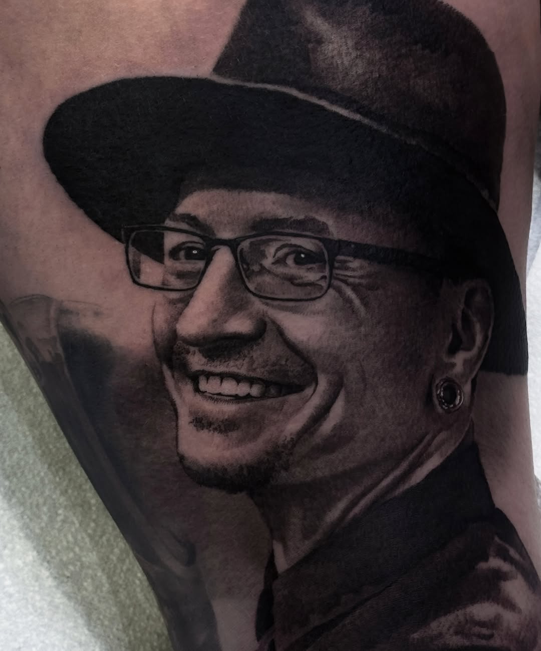 Tattoo by @rikkileetattoo โ realism, black_and_grey