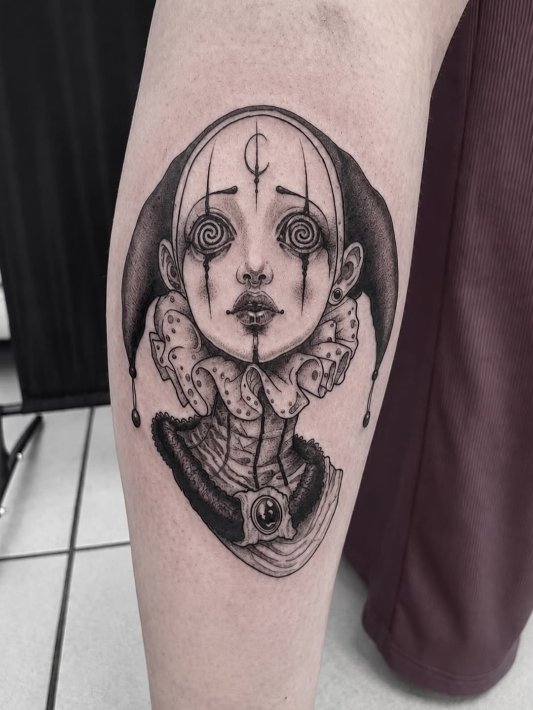 Tattoo by @amber_noir_tattoo โ dark_realism, black_and_grey