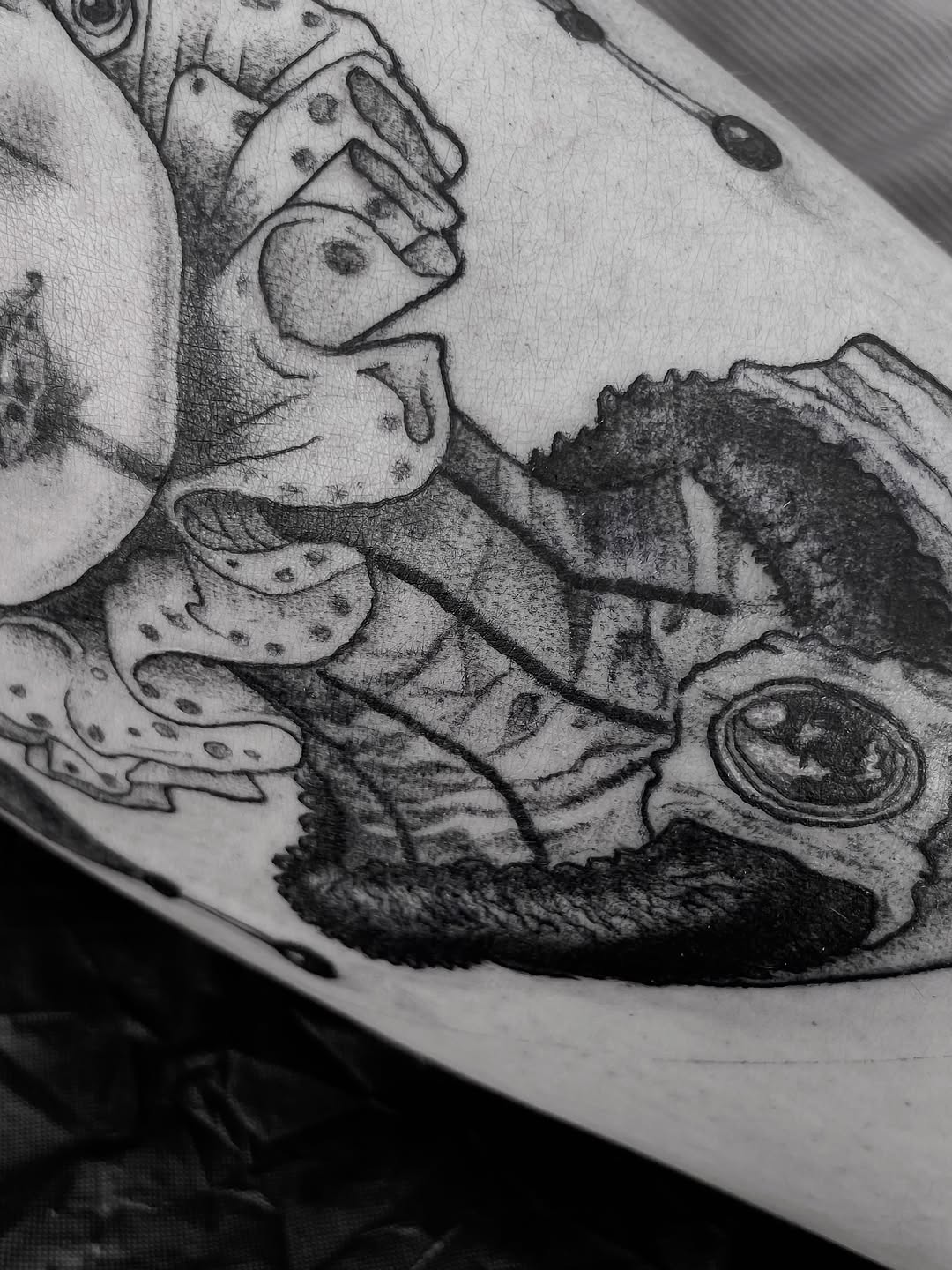 Tattoo by @amber_noir_tattoo โ realism, black_and_grey