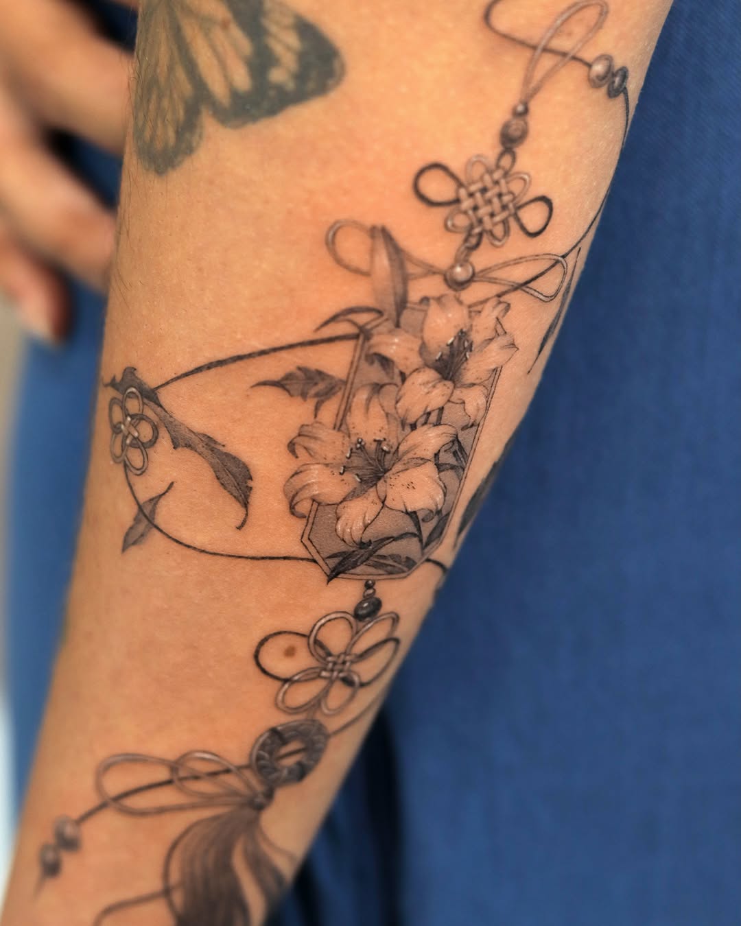 Tattoo by @heon.tattoo — realism, black_and_grey