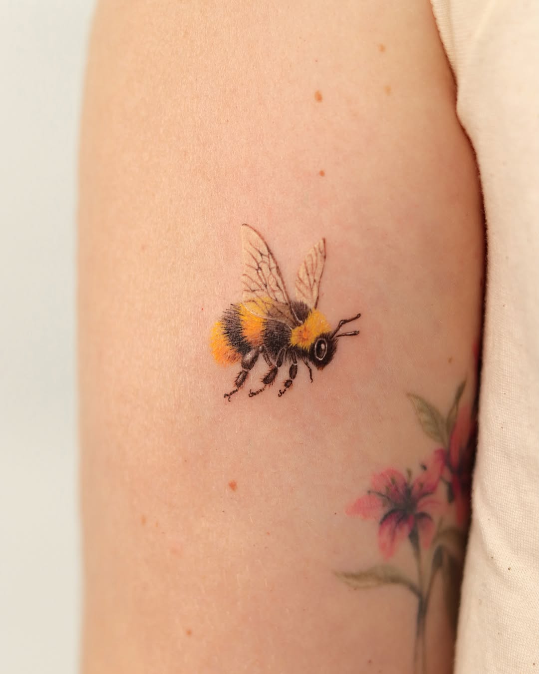 Tattoo by @heon.tattoo — realism, fine_line