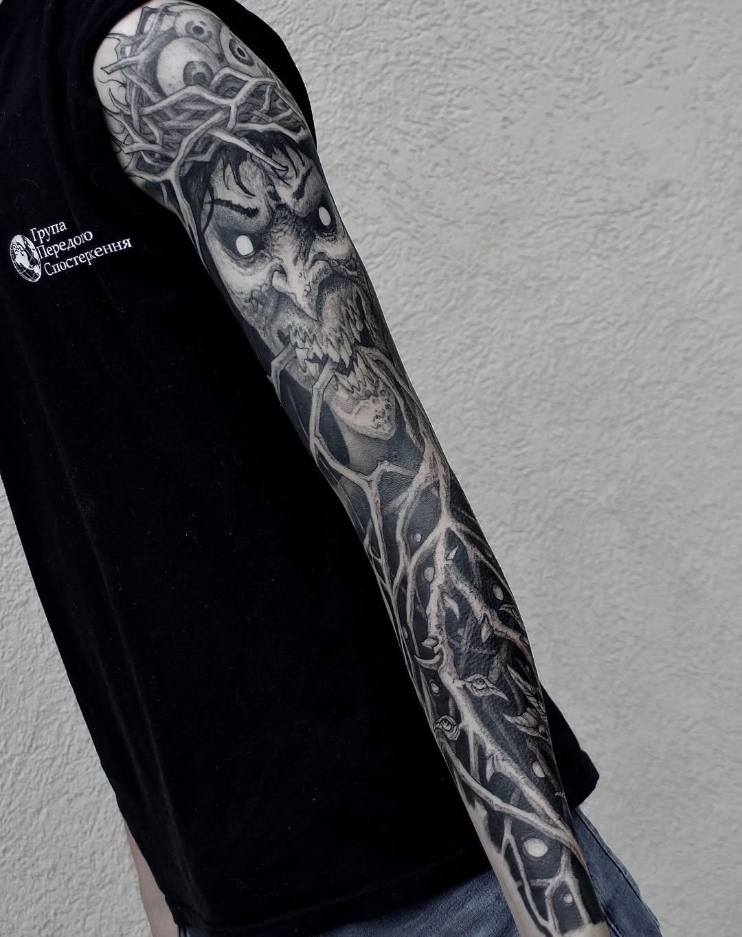 Tattoo by @bloodstonetattoos — dark_realism, black_and_grey