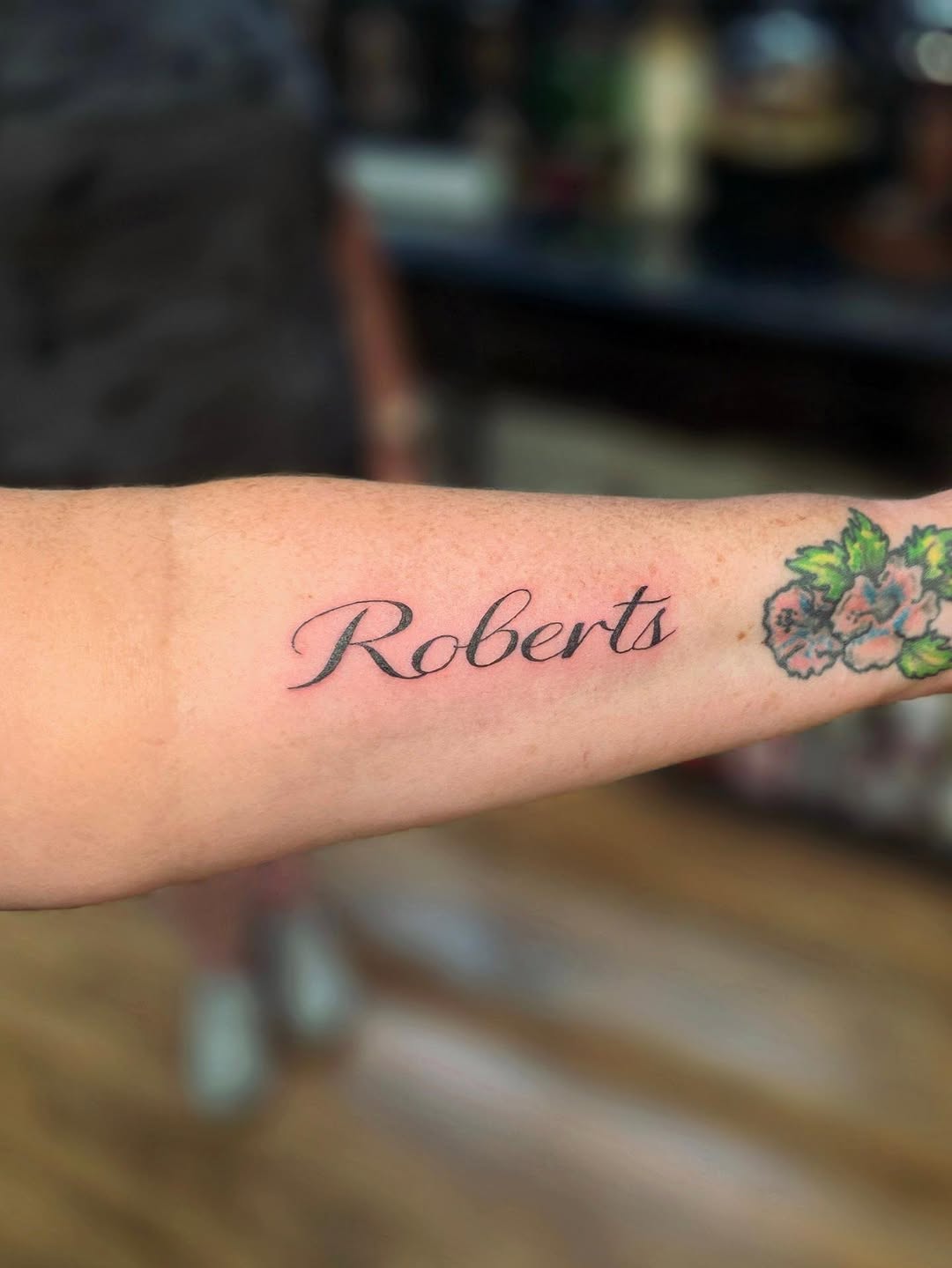 Tattoo by @toms_athenaeum — lettering_script, fine_line