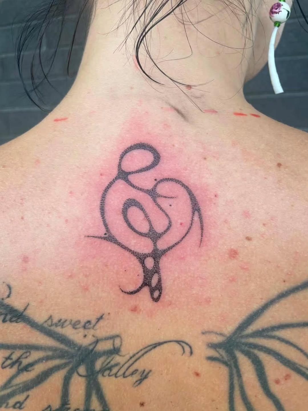 Tattoo by @umubiri.tattoo — lettering_script