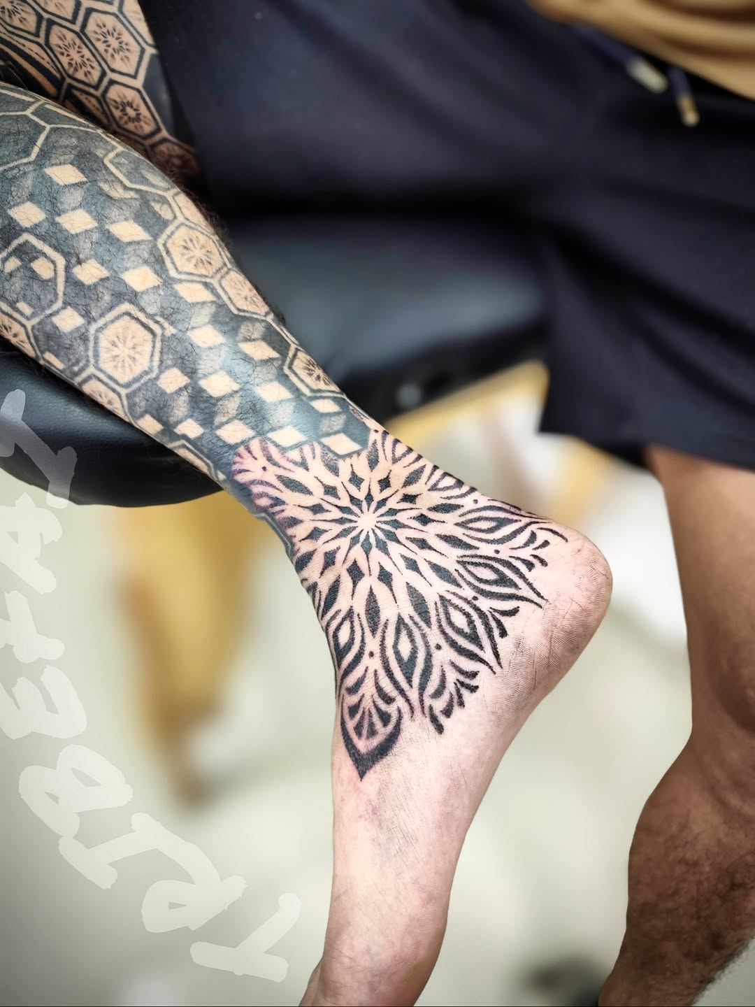 Tattoo by @tribe_tattoo — geometric, ornamental