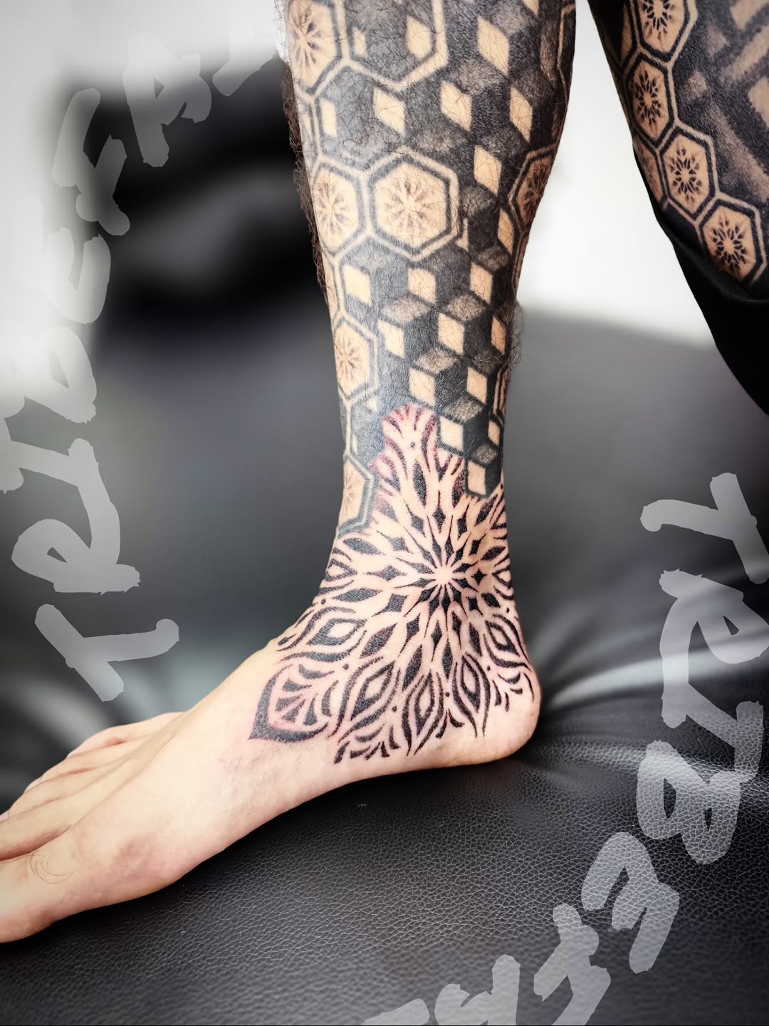 Tattoo by @tribe_tattoo — geometric, blackwork
