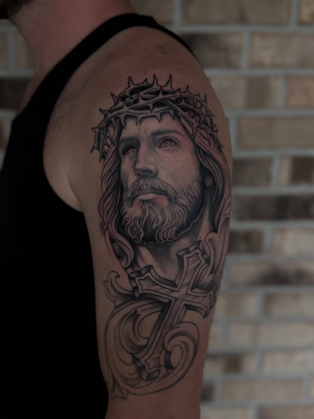 Tattoo by @stormtattoos504 — realism, black_and_grey