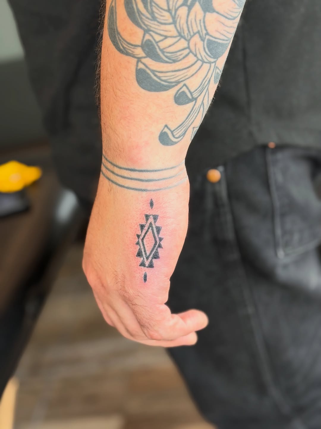 Tattoo by @loveyoutodeathtattoo — geometric, minimalist