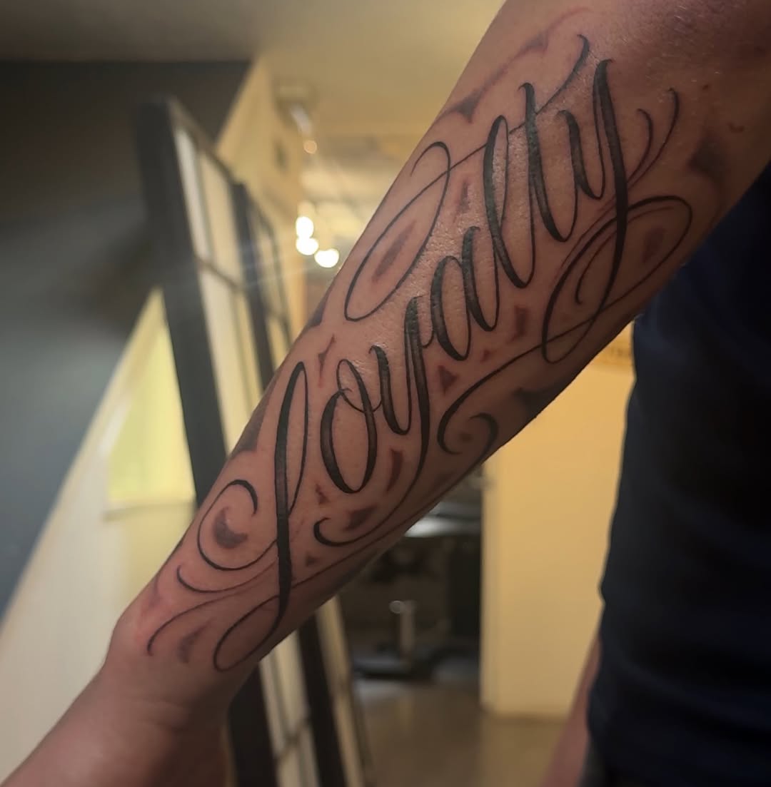 Tattoo by @jackcalliertattoos โ lettering_script, chicano