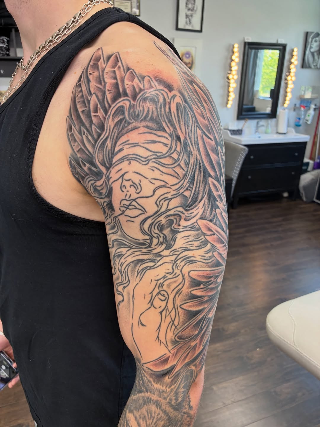 Tattoo by @streetmeat.tat — realism, black_and_grey