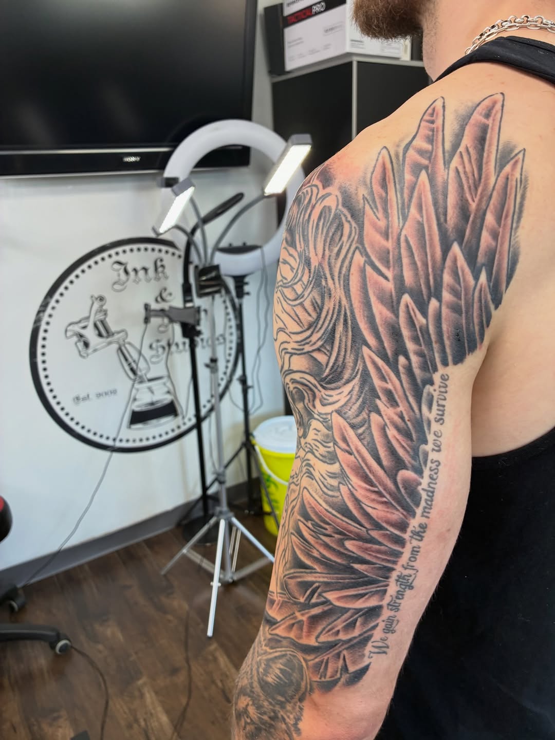 Tattoo by @streetmeat.tat — realism, black_and_grey