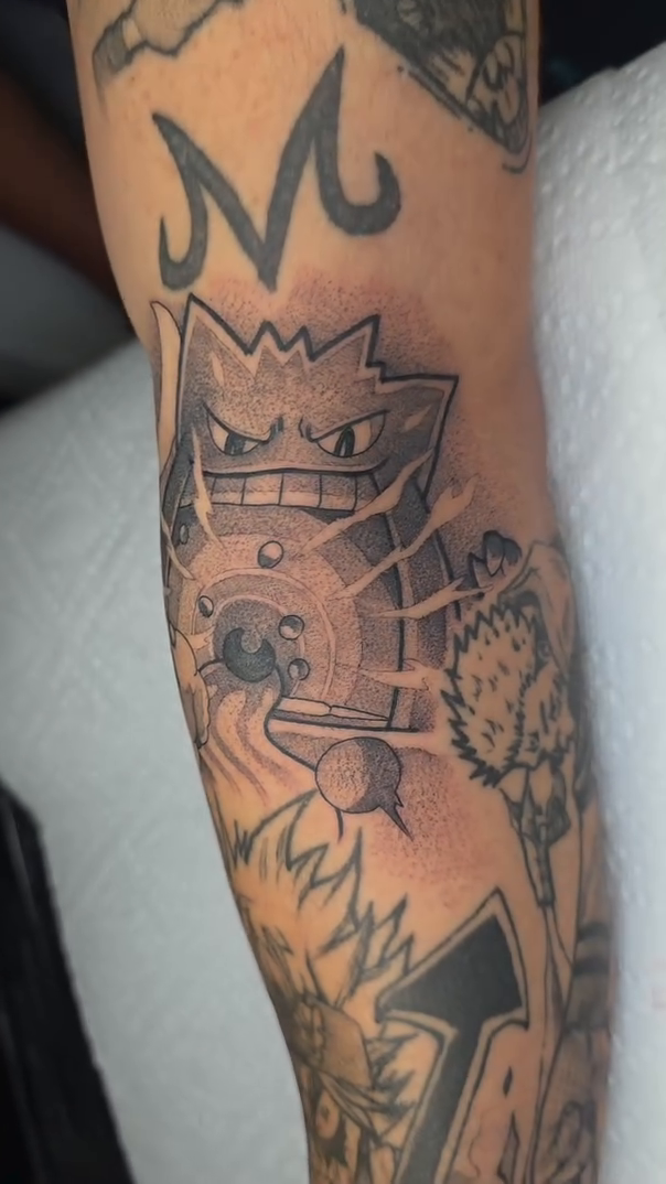 Tattoo by @traditional_tattoos20 — anime, black_and_grey