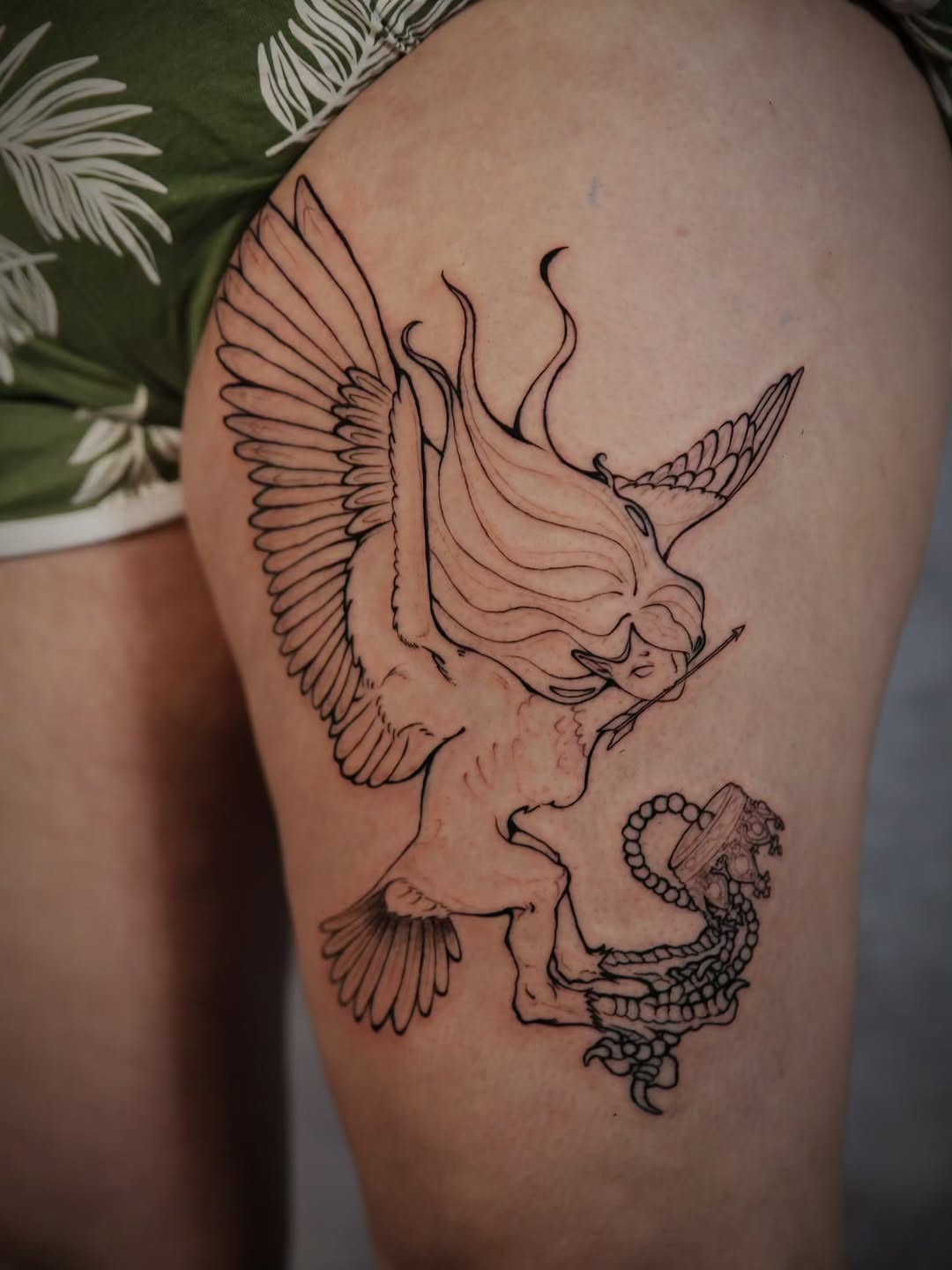 Tattoo by @hyena_lapis — illustrative