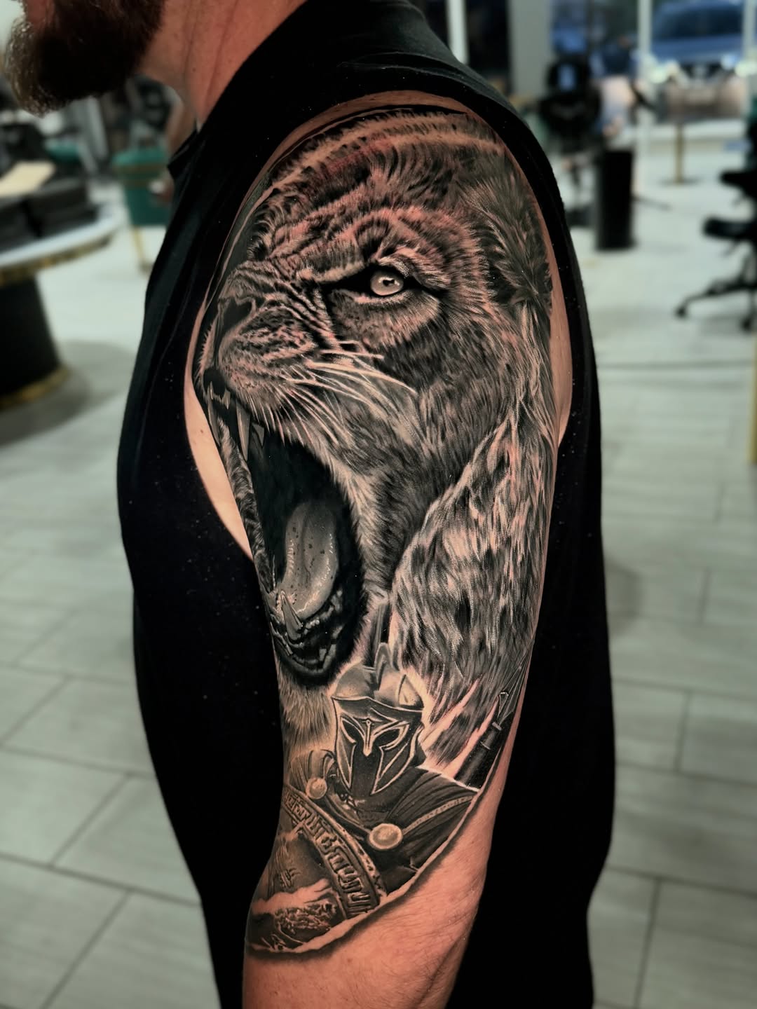 Tattoo by @monkey.tattoo.art β realism, black_and_grey