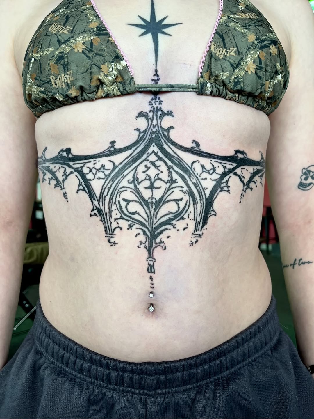 Tattoo by @inkedcherub — blackwork, ornamental
