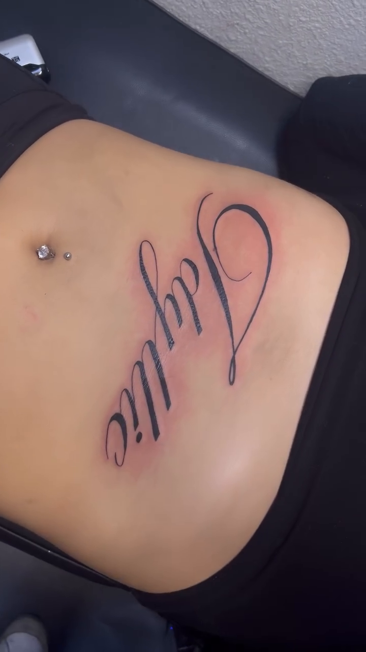 Tattoo by @ink.booo โ lettering_script