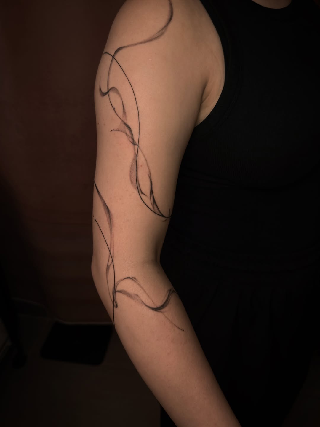 Tattoo by @goatmag.azine — fine_line, black_and_grey