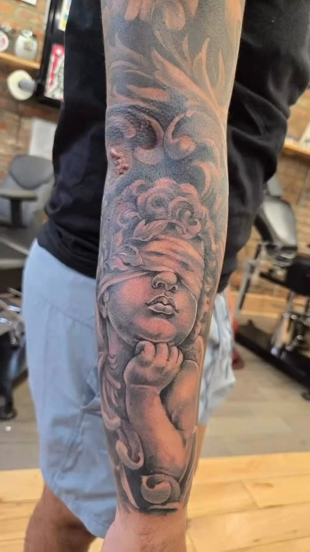 Tattoo by @kustomhustletattoo — black_and_grey, realism