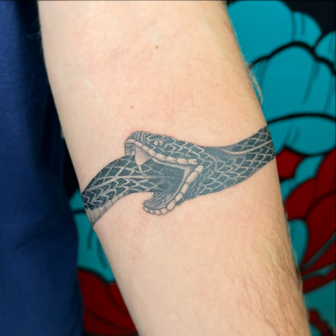 Tattoo by @artisanbodypiercingandtattoo — black_and_grey, realism