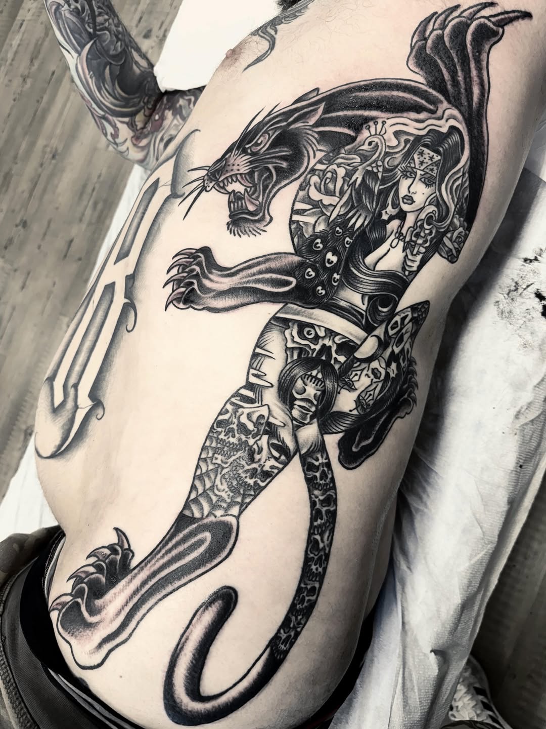 Tattoo by @chrisspriggs — american_traditional, black_and_grey