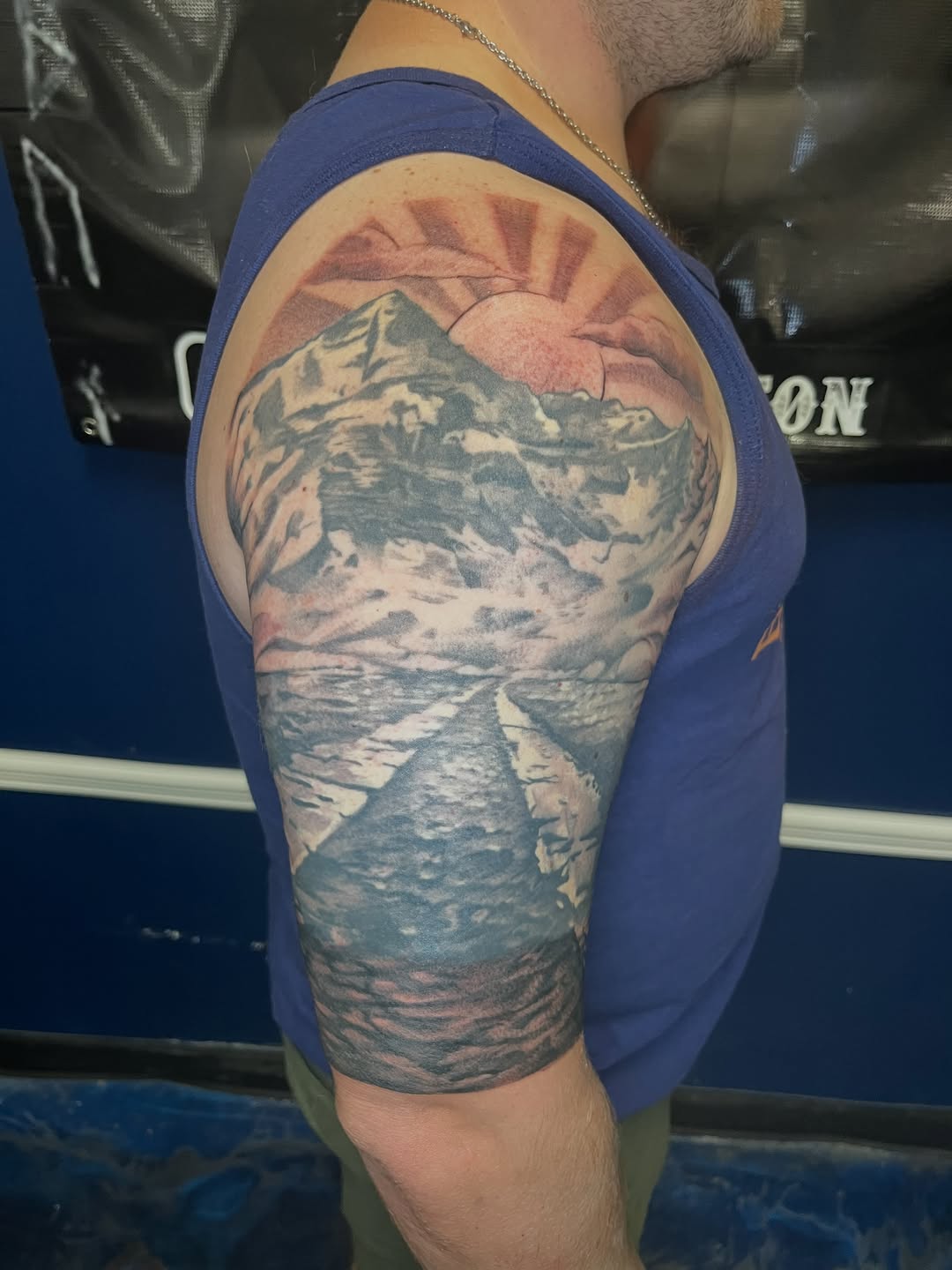 Tattoo by @necro_comicon — realism, black_and_grey
