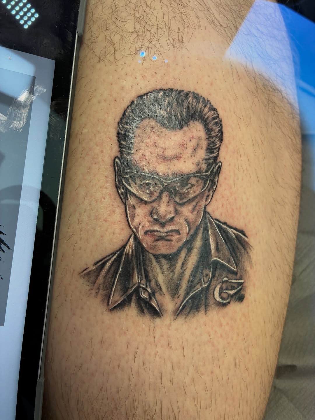 Tattoo by @streetmeat.tat — realism, black_and_grey