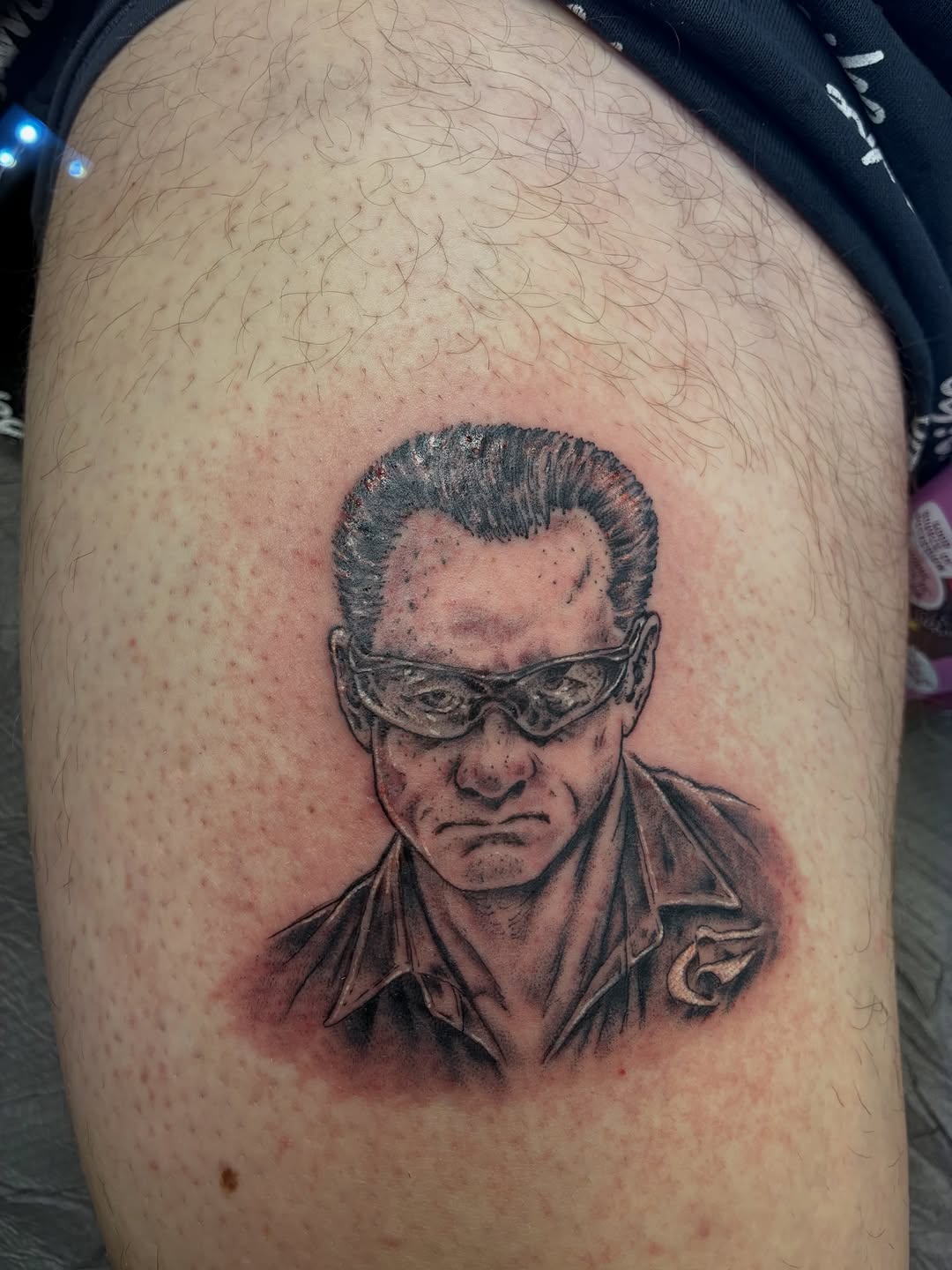 Tattoo by @streetmeat.tat — realism, black_and_grey
