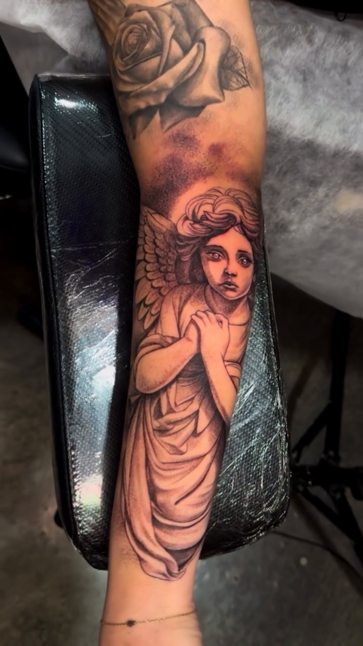 Tattoo by @lujanink — black_and_grey, realism