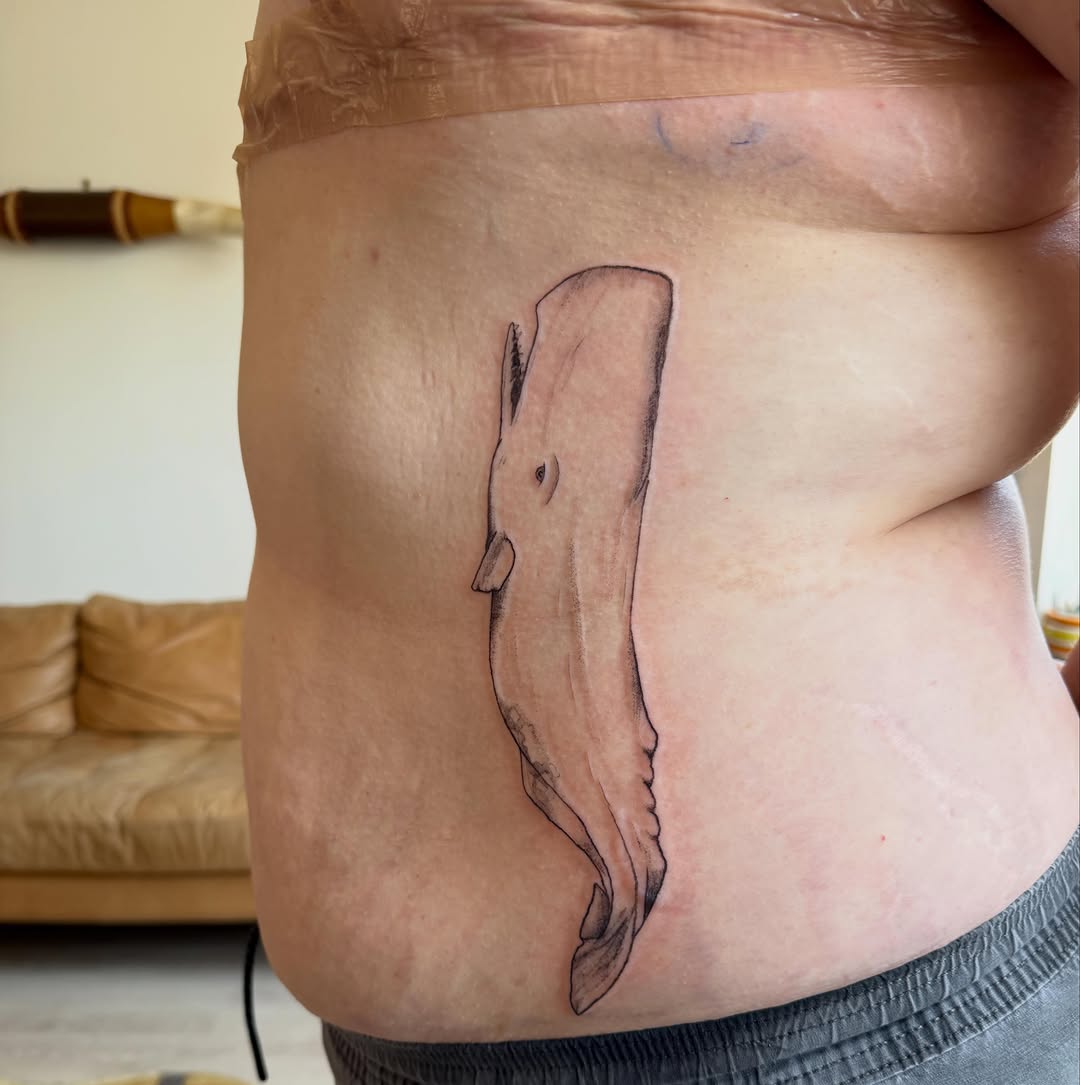 Tattoo by @kat.o.tat — realism, black_and_grey