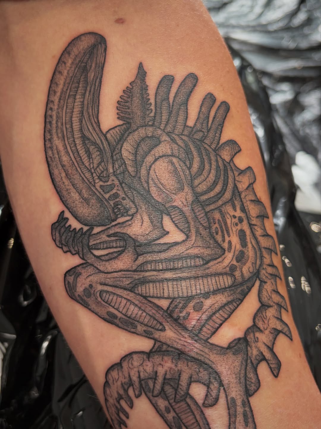 Tattoo by @poppyoliviatattoo — dark_realism, black_and_grey