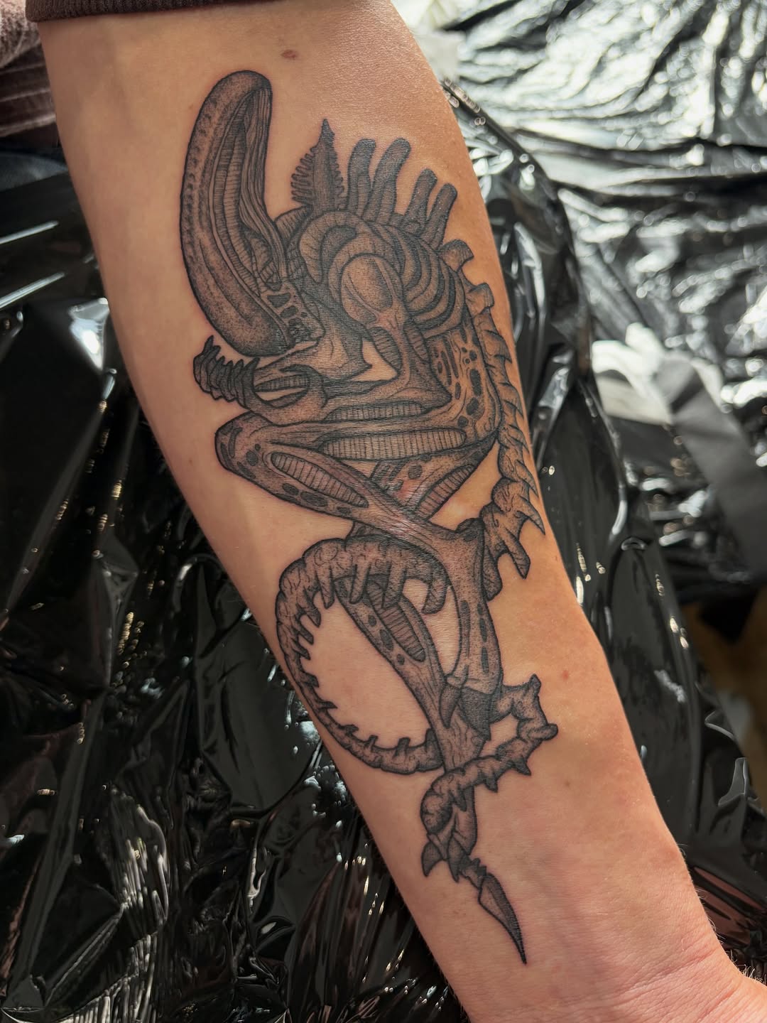 Tattoo by @poppyoliviatattoo — dark_realism, black_and_grey