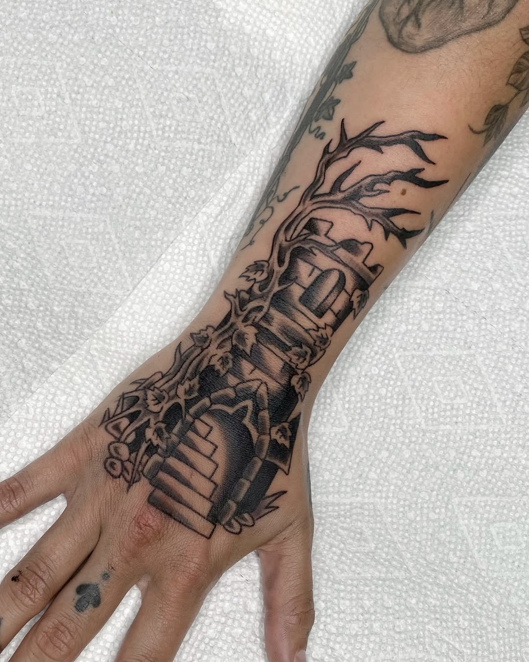 Tattoo by @morgana.sutherland — black_and_grey, dark_realism