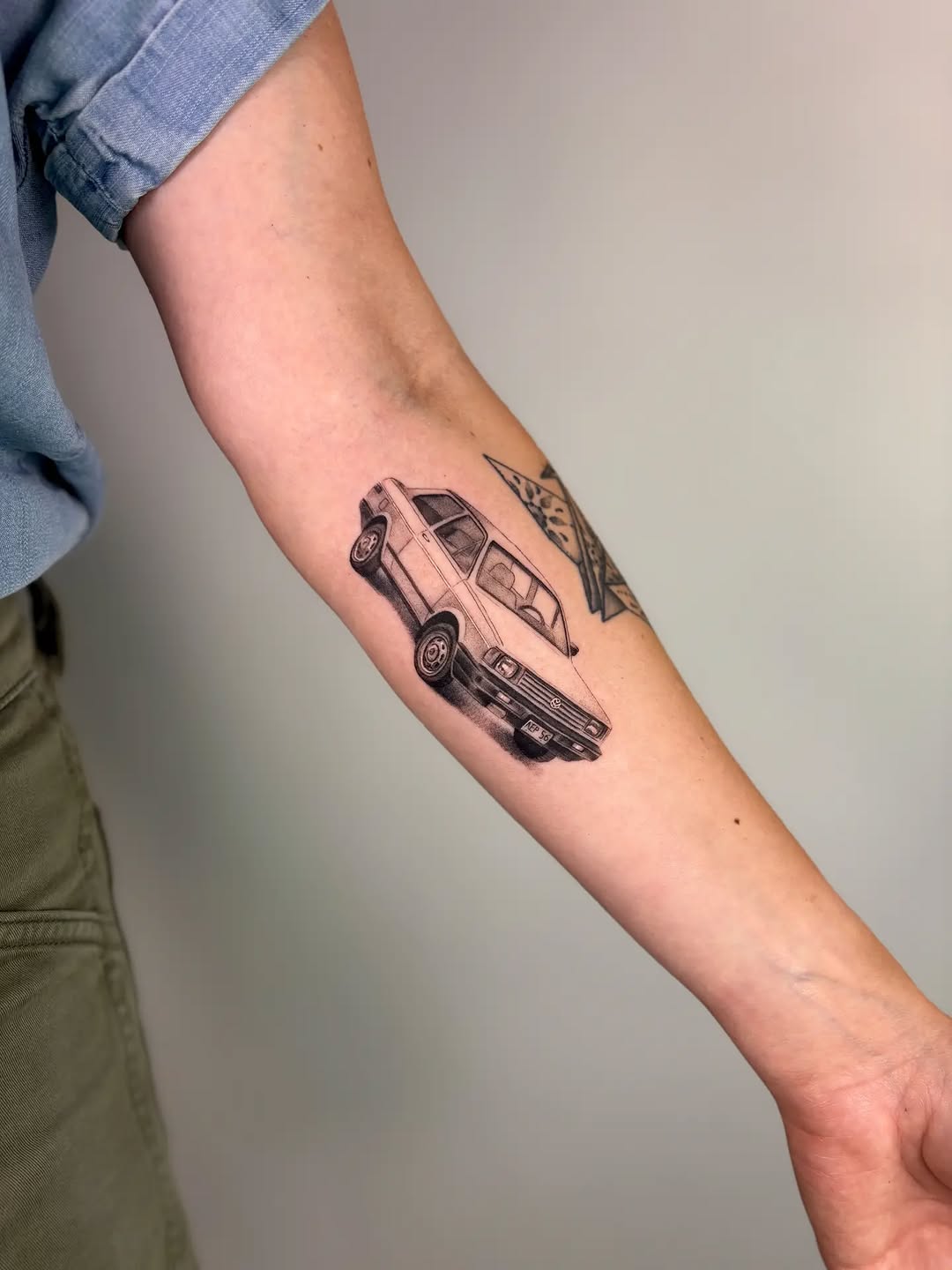 Tattoo by @ao.tats — realism, black_and_grey