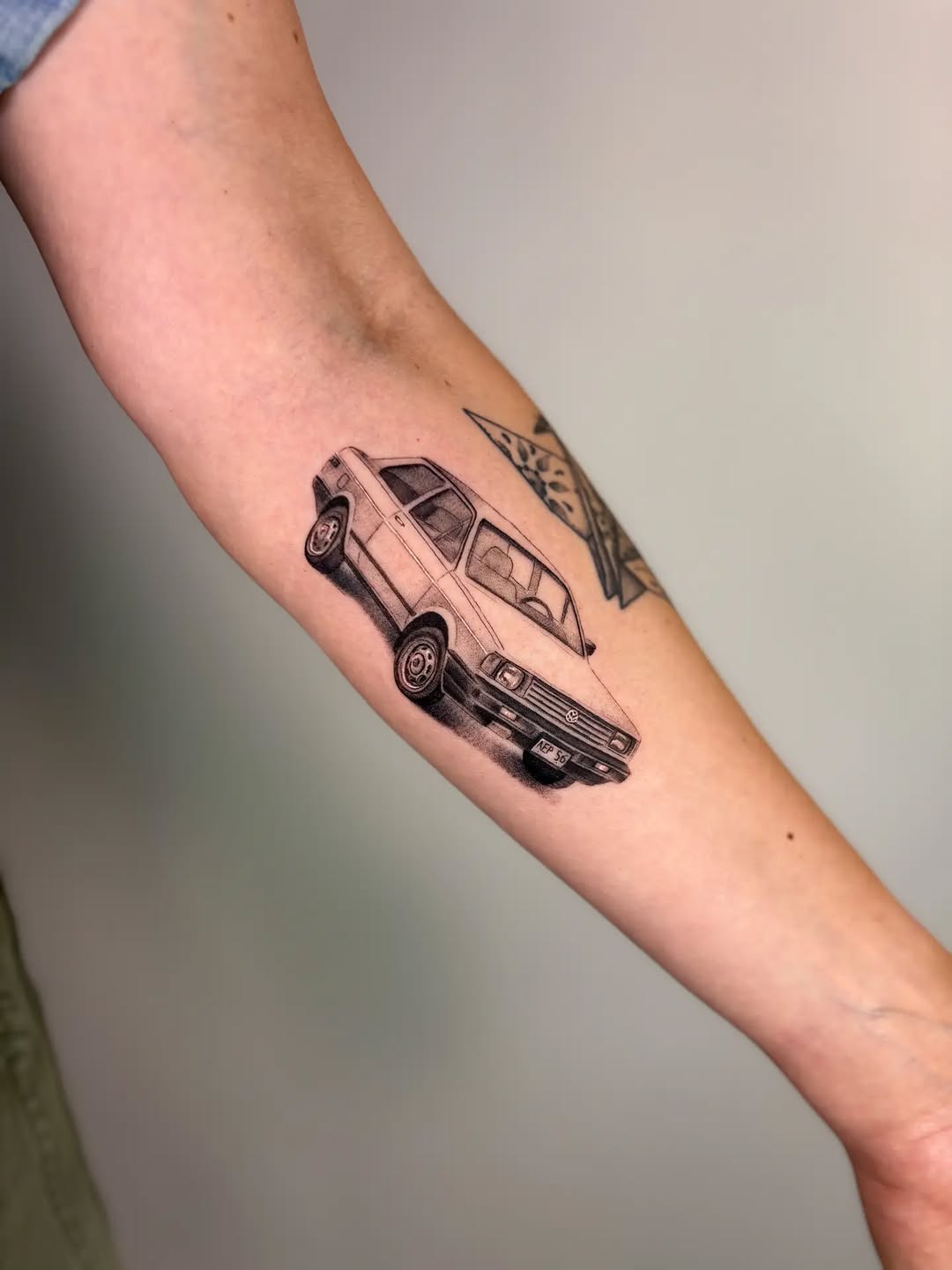 Tattoo by @ao.tats — realism, black_and_grey