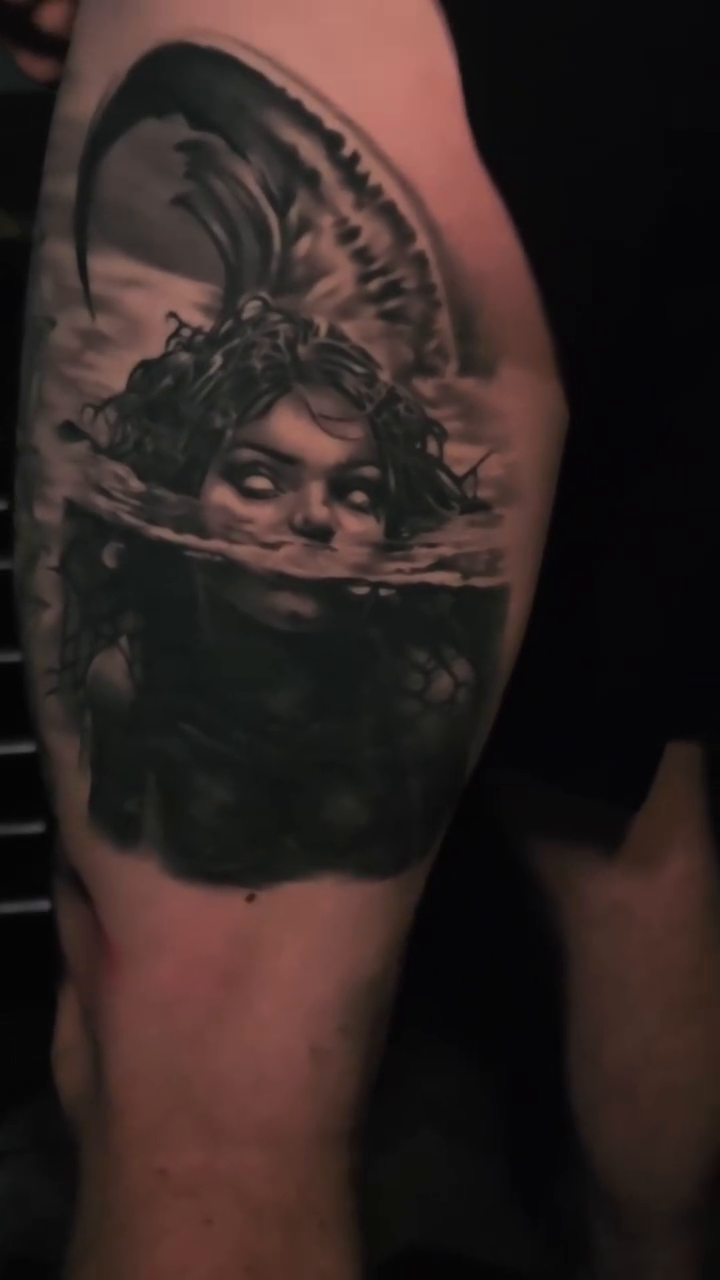 Tattoo by @nathan.matherstattooist — dark_realism, black_and_grey