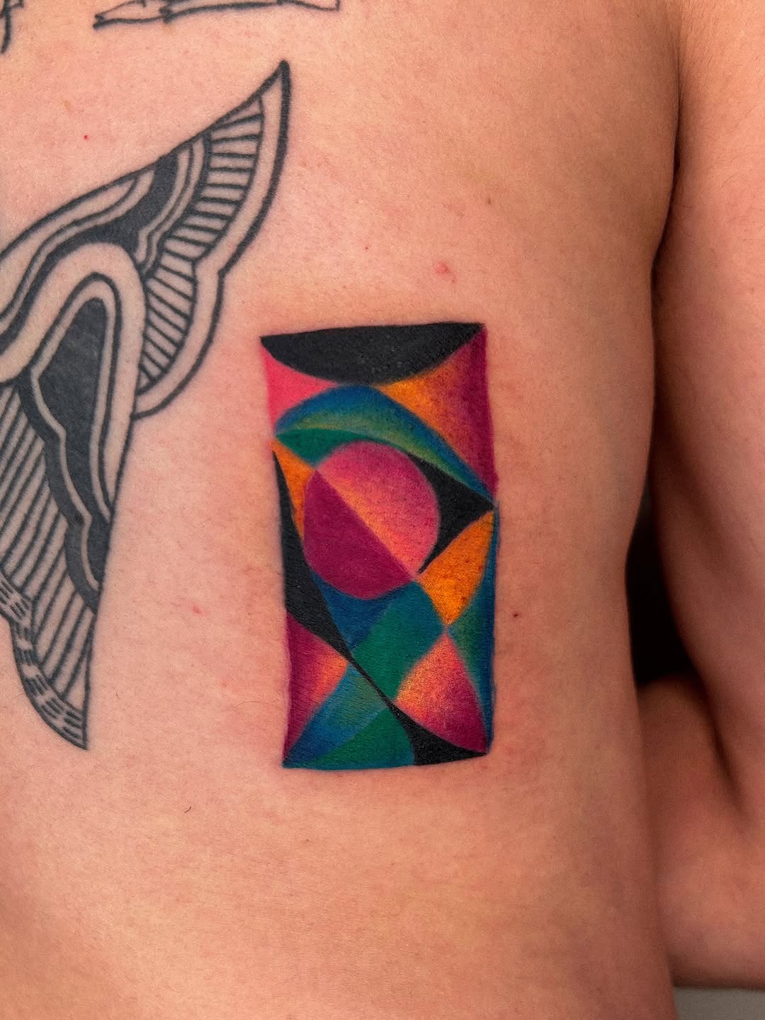 Tattoo by @juliatatua — geometric, watercolor