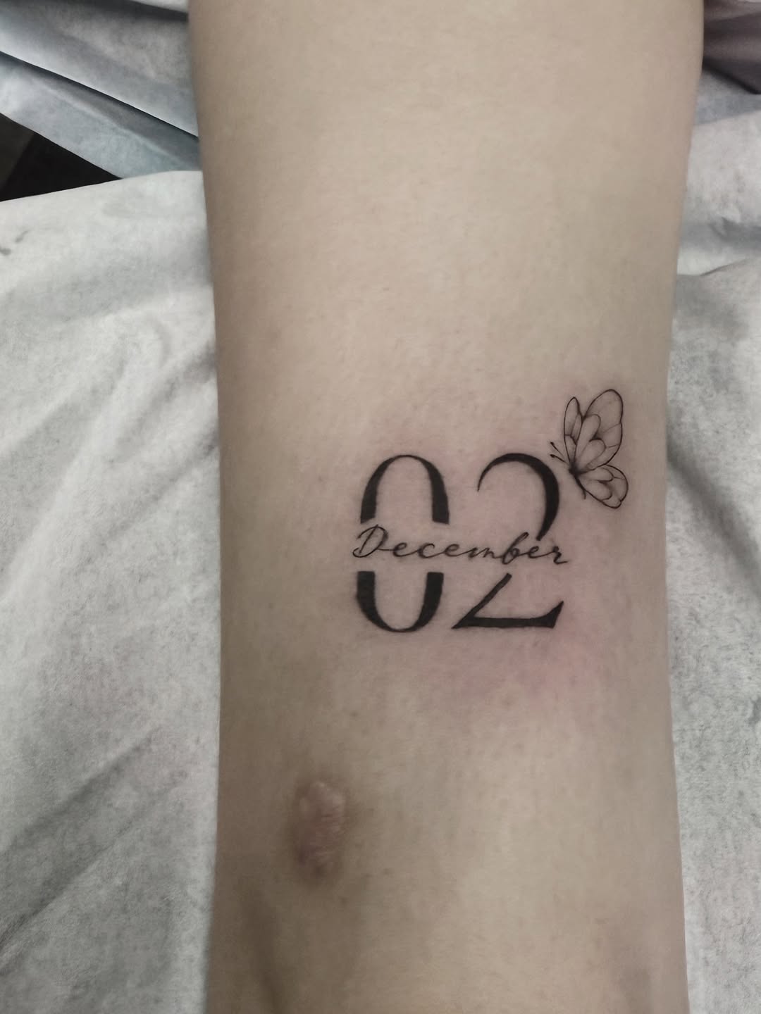 Tattoo by @shengguevaratattoos — lettering_script, fine_line