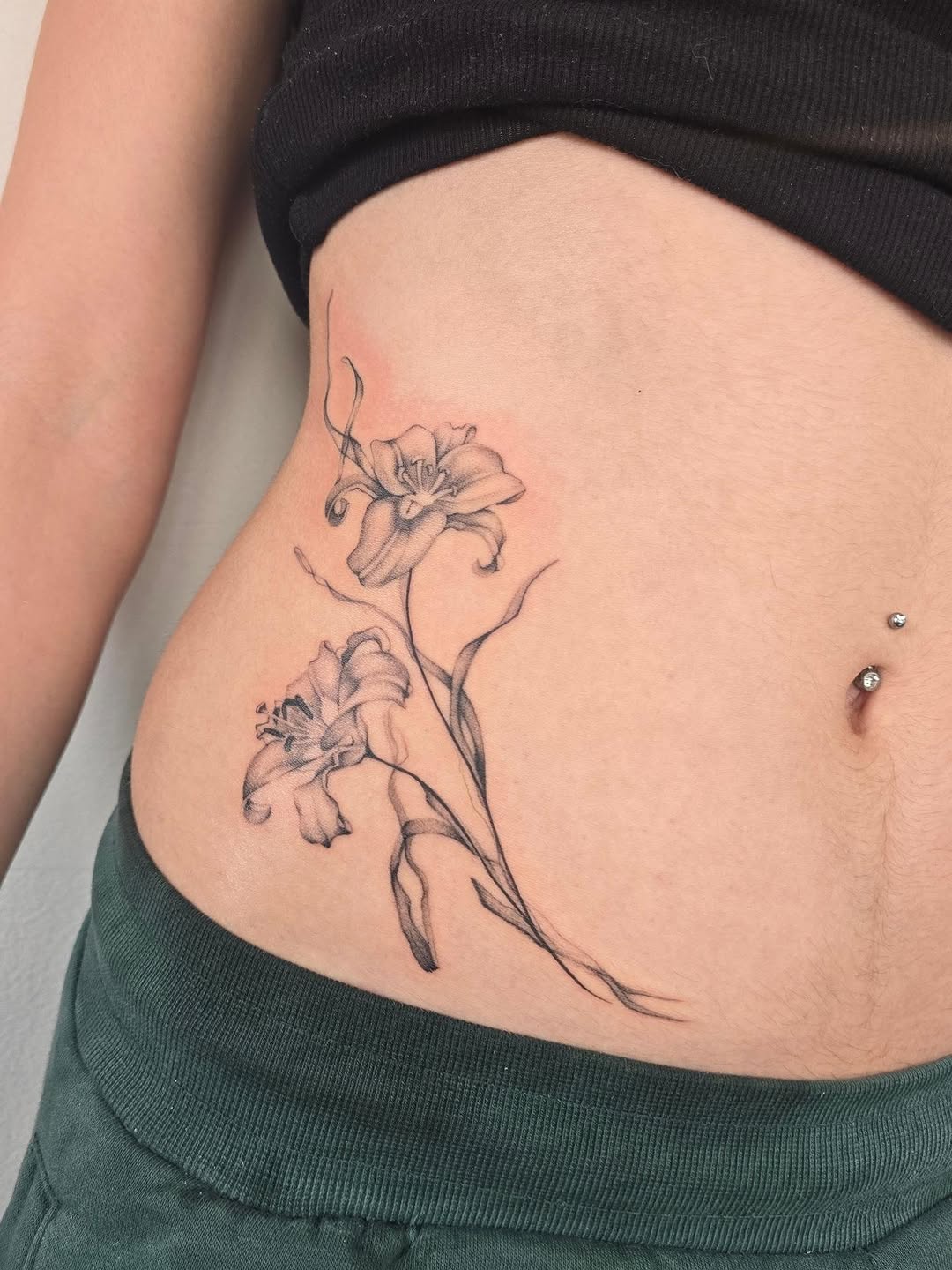 Tattoo by @danielbi.tattooart — fine_line, black_and_grey