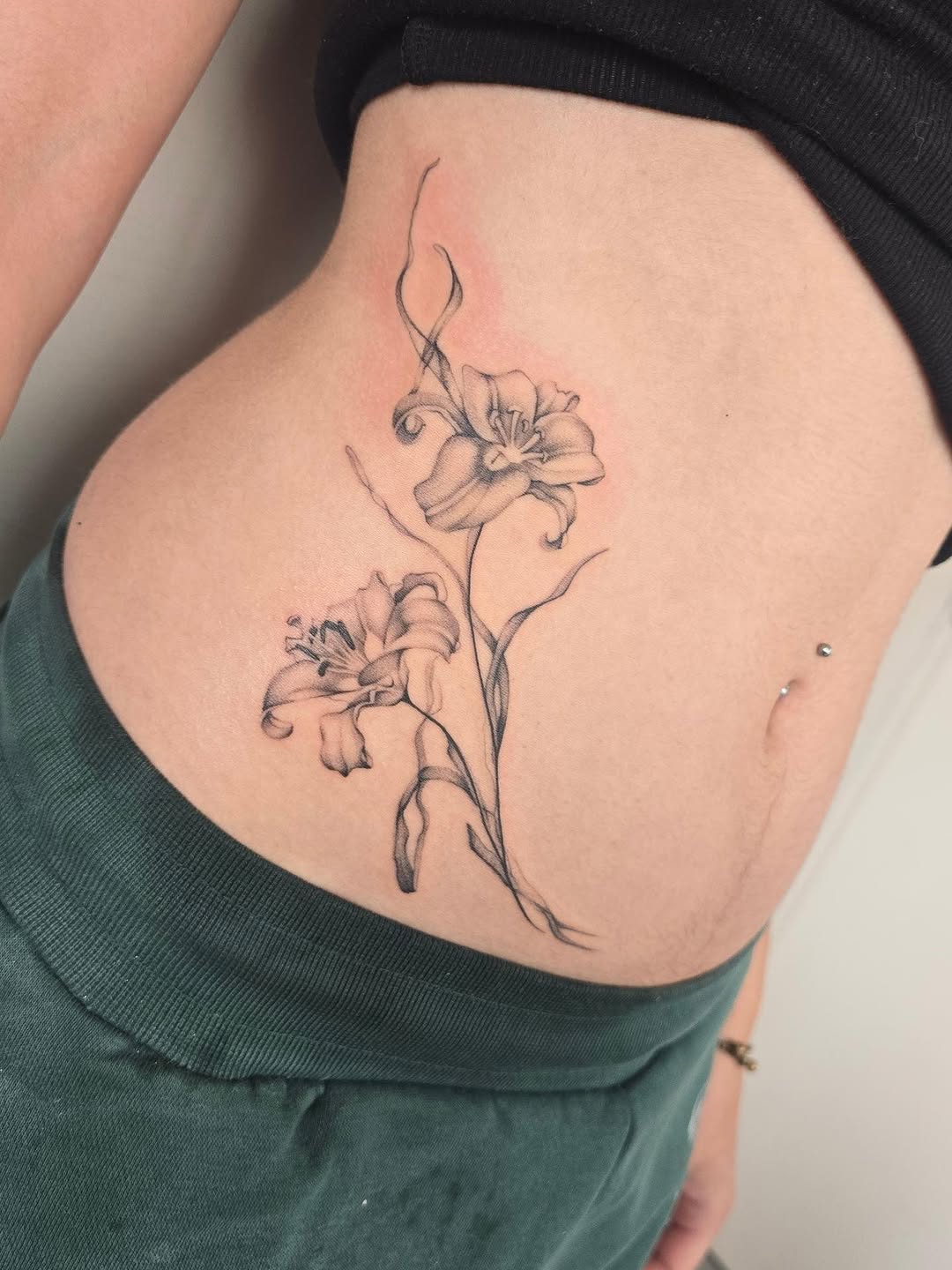 Tattoo by @danielbi.tattooart — fine_line, black_and_grey